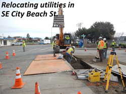 Relocating utilities in SE City Beach St