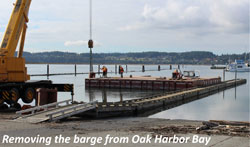 Removing the barge from Oak Harbor Bay